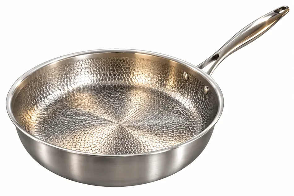 Illustrative studio image of a metal frying pan